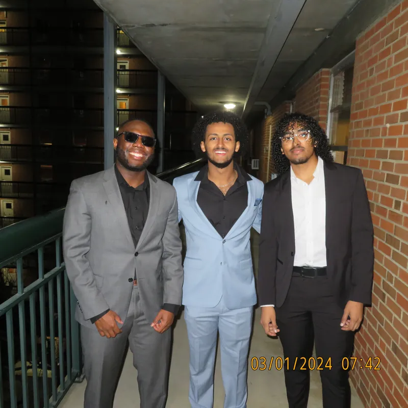 Friends dressed for a formal occasion
