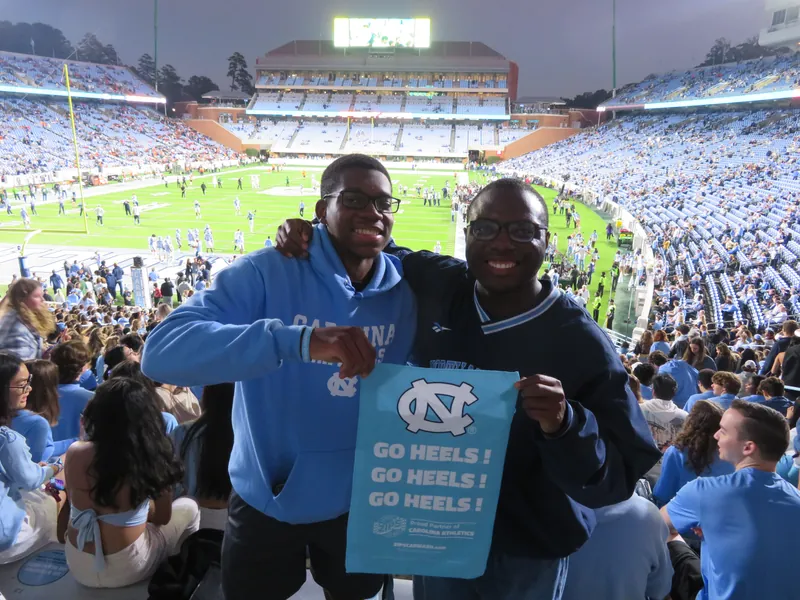 Friends at a UNC football game