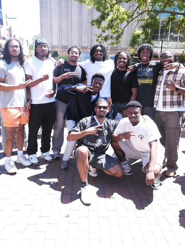 A large group gathered on campus