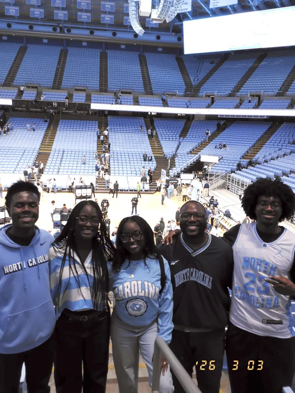 Friends gathered in a stadium